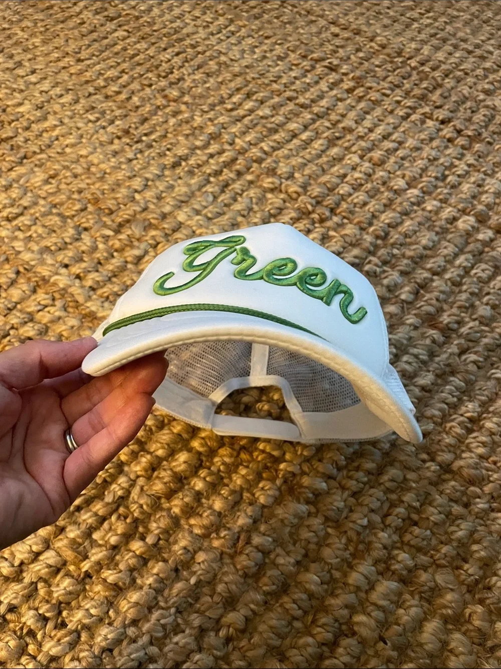 White Trucker Hat with Green Script Accent